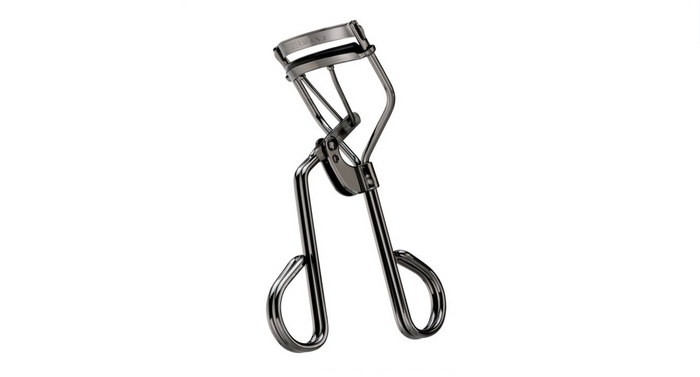 Silver metal eyelash curler with black rubberized handles, designed for precise curling of lashes, Pro Master Lash Curler | Tweezerman.