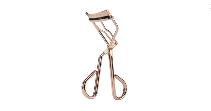 Procurl Lash Curler | Tweezerman in rose gold finish designed for precise lash curling and enhancing natural eye beauty with gentle, easy-to-use mechanism.