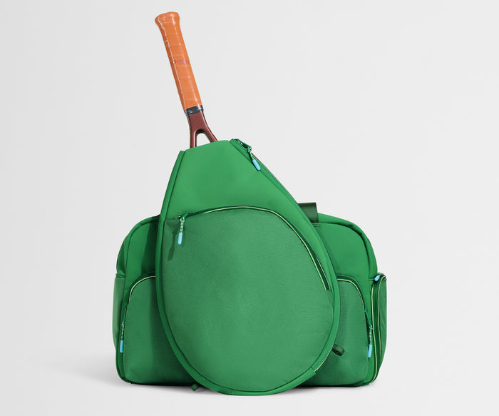 //
The Racket Bag seamlessly attaches with a magnetic back sleeve.