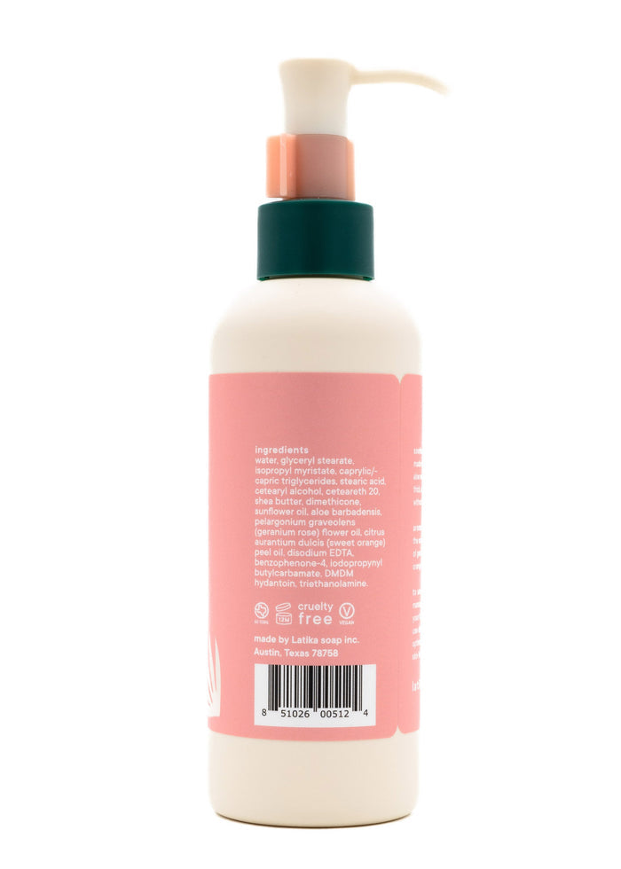 Back view of a skincare bottle featuring ingredients list and cruelty-free label for Rose (wildflower) Hand + Body Cream | Latika with a pump dispenser.