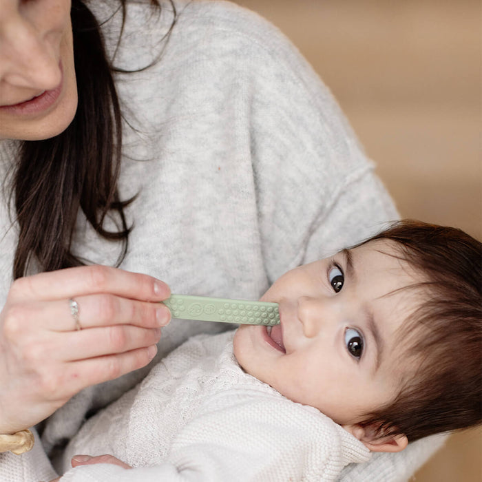 ezpz sensory tongue depressor in sage green and pewter gray / silicone tongue depressor for babies #color_sage-pewter