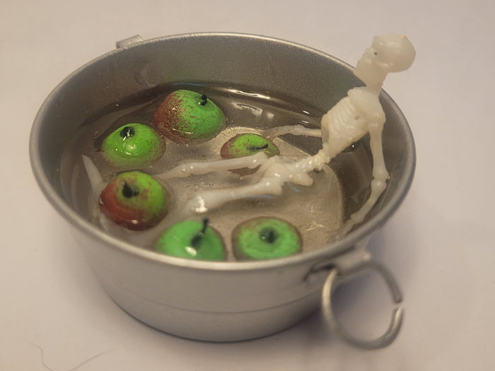 Skeleton Bobbing for Apples in Galvanized Tub