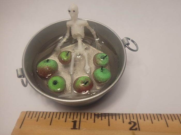 Skeleton Bobbing for Apples in Galvanized Tub