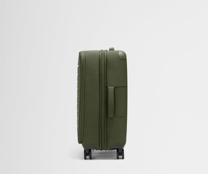 Side product view of The Softside Medium suitcase in Olive Green shown fully expanded
//
Unzip to expand an additional 1.75" (4.5 cm) of space for extra packing room.