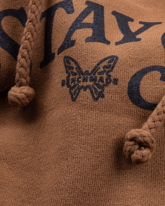 Stay Sharp Text and Butterfly Logo Detail - Close-up of Hoodie Graphics | Benchmade Knife Co.