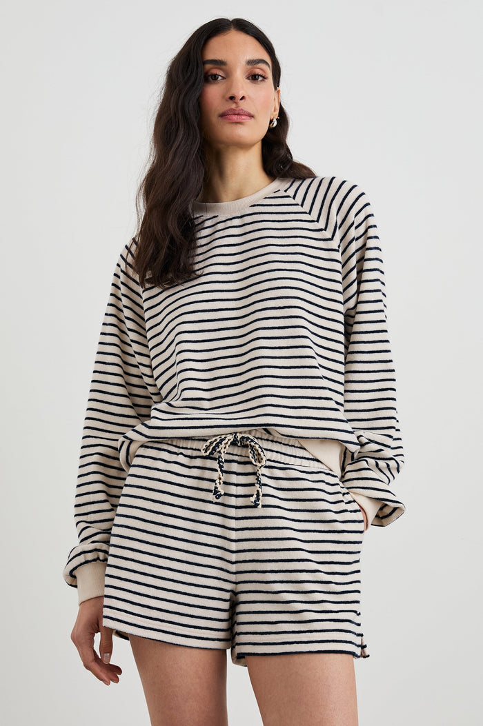 Teddy Shorts with a Drawstring Waist, Two Front Pockets and one Back Patch Pocket in Sailor Stripe Terry Towel Stripe Colorway, Horizontal Tan and Navy Stripes - Front View Featured on Model