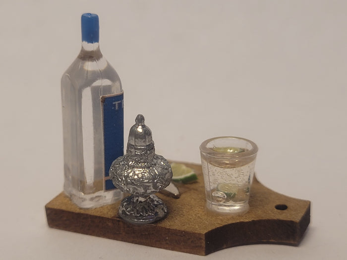 Tequila Shot with Lime on Wooden Board