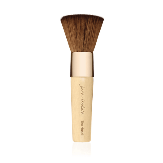 The Handi™ Brush | Jane Iredale with soft, dense bristles and a polished wooden handle designed for flawless application in skincare and makeup routines.