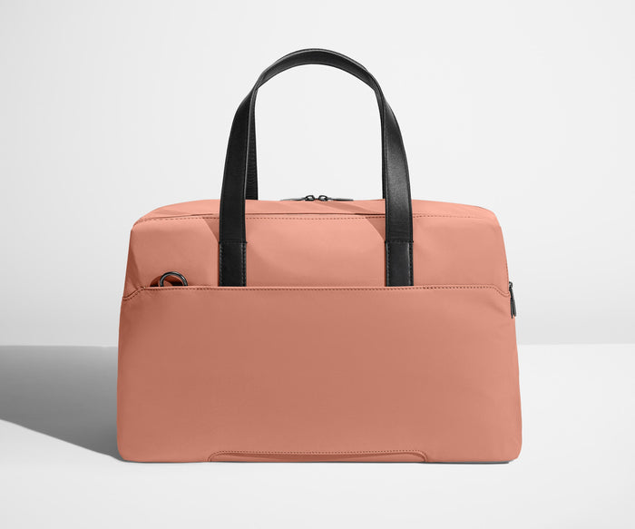 Back view of The Overnight bag with trolley sleeve pass-through