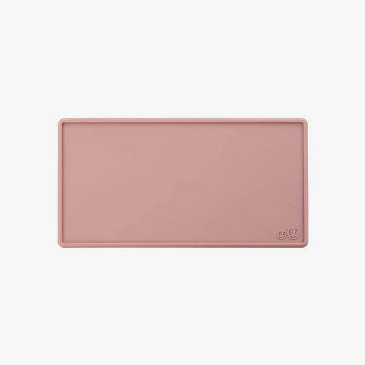 The Tiny Placemat in Blush is a non-slip, silicone placemat that fits on most highchair trays #color_blush