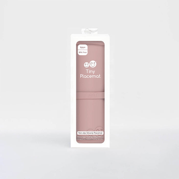 The Tiny Placemat in Blush is a non-slip, silicone placemat that fits on most highchair trays #color_blush