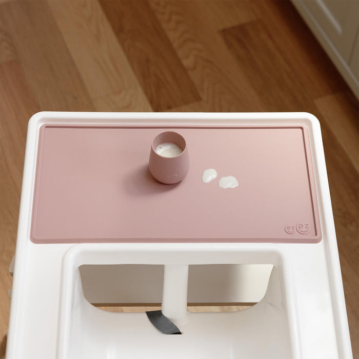 The Tiny Placemat in Blush is a non-slip, silicone placemat that fits on most highchair trays #color_blush