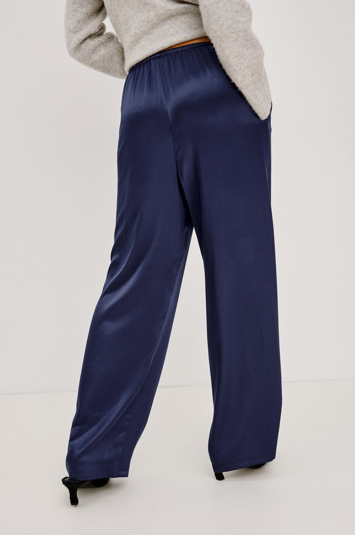 Virgo Pant in Satin-Back Crepe With Srtaight Legs, Drawstring Waist, and Side-Seam Pockets in Navy Colorway - Lower Body Back View Featured on Model