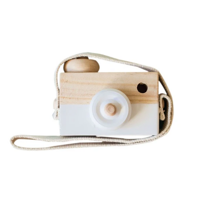 white wooden toy camera